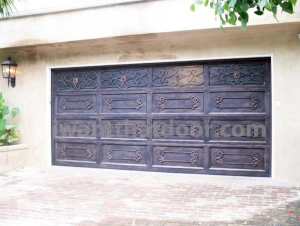 Custom iron garage door for a coastal home made by Universal Iron Doors