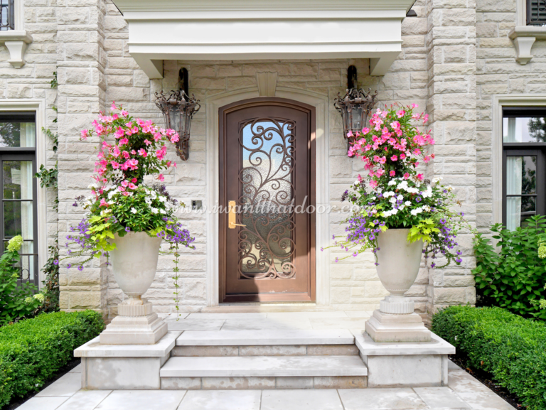 Iron door from Precise Iron Doors on a beautiful residential home