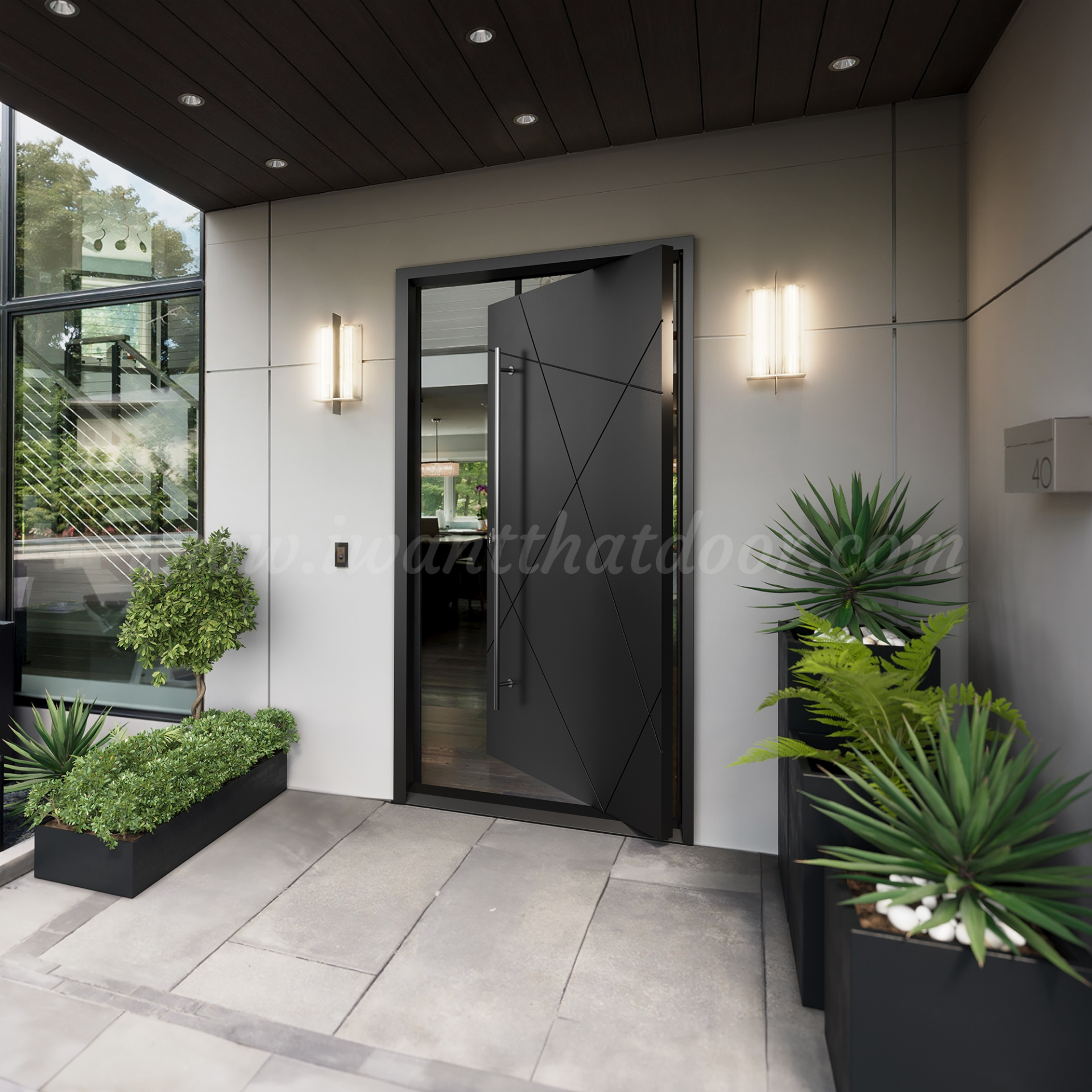 Custom pivot door from Universal Iron Doors installed in a luxury home