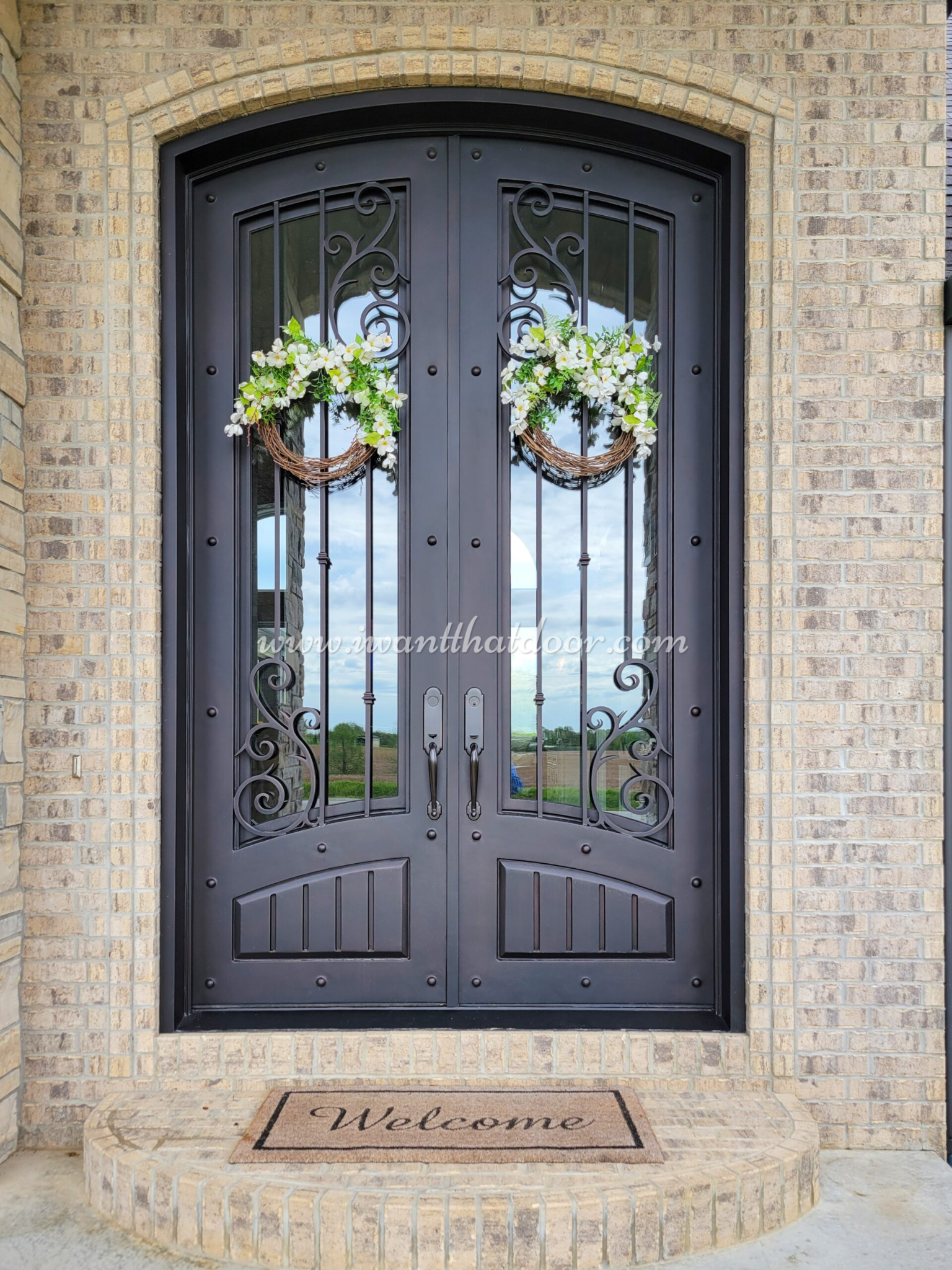 Tudor style iron door made by Universal Iron Doors